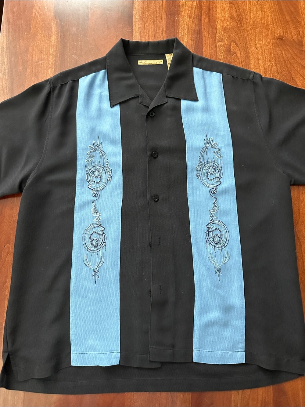 Black button up shirt with Light Blue Panels. Size Large.